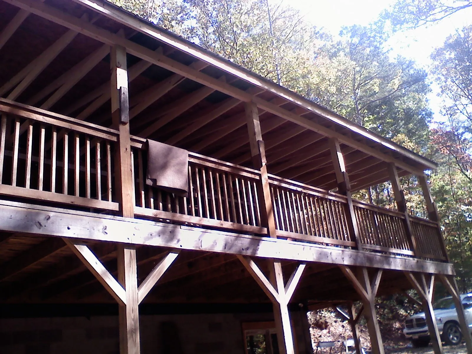 Timber framing under a new elevated porch and deck — Roof Leak Repair in Nashotah by Roofing Brothers